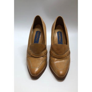 Wild pair tan leather uppers , suede heel size 7
